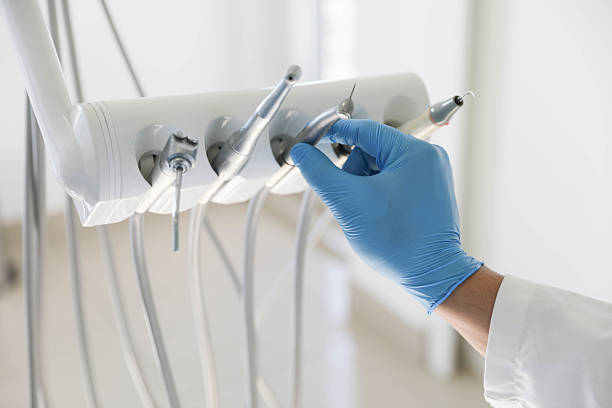 Professional Tooth Extraction technician working in Abbotsford, WI